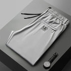 【40-115kg】🔥Pantaloni noi de mătase elastică din gheață pentru primăvară și vară 2026