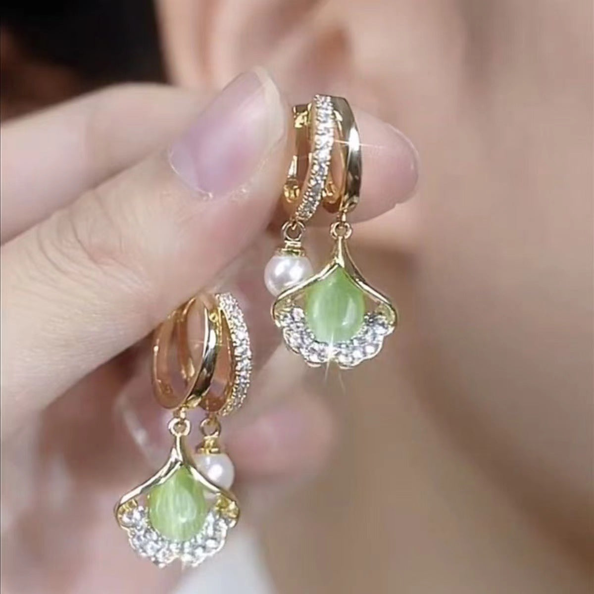✨【50%OFF】💖【Cumpărați 1, primiți 1 gratuit】Cat Eye Ginkgo Leaf Stud Cercei